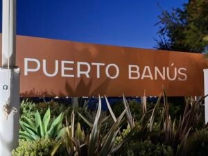 Puerto Banús Nightlife: Our First-Hand Marbella Guide Puerto Banus sign at night in Marbella Spain