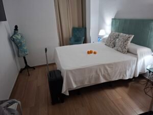 HOTEL MADRID REVIEW Double room at Hotel Madrid Torrevieja with bed and seating area