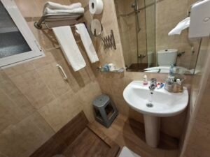 HOTEL MADRID REVIEW Hotel Madrid Torrevieja bathroom with sink mirror and shower