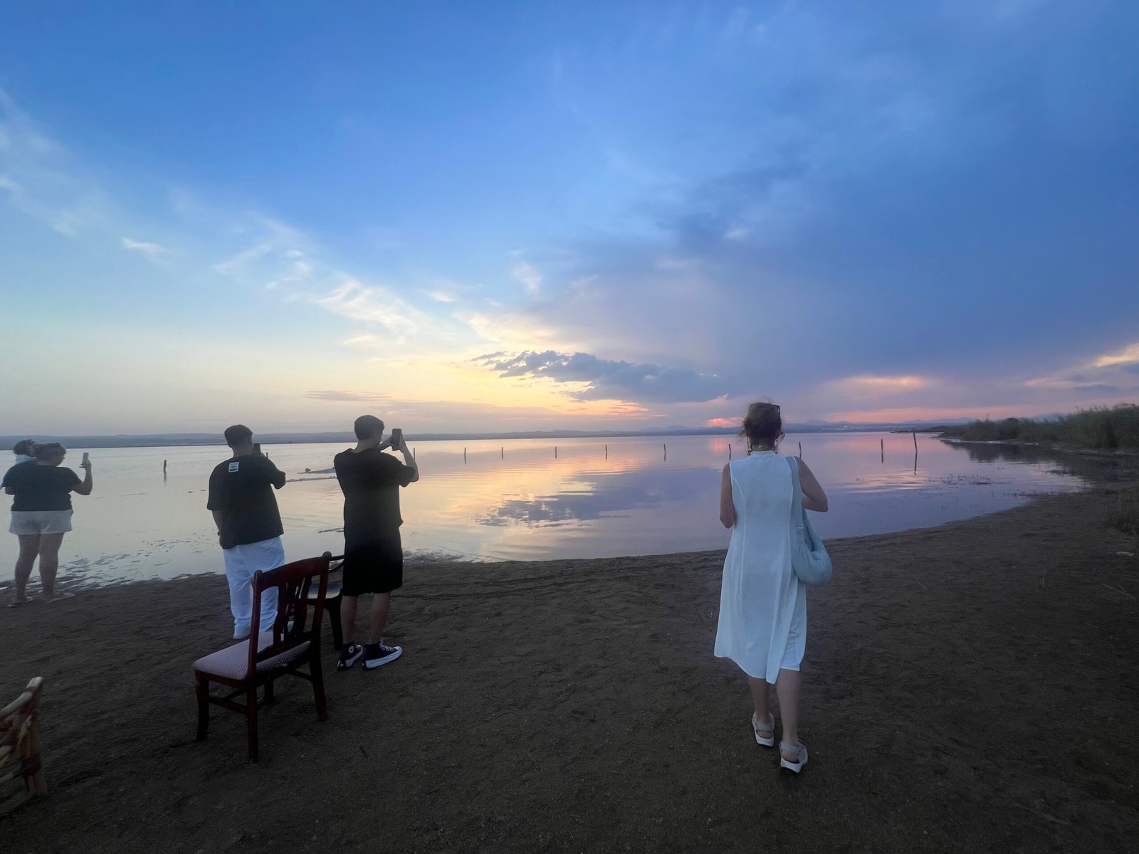 Laguna Rosa Torrevieja: Our Visit to Spain’s Pink Lake Visitors watching sunset at Laguna Rosa Torrevieja