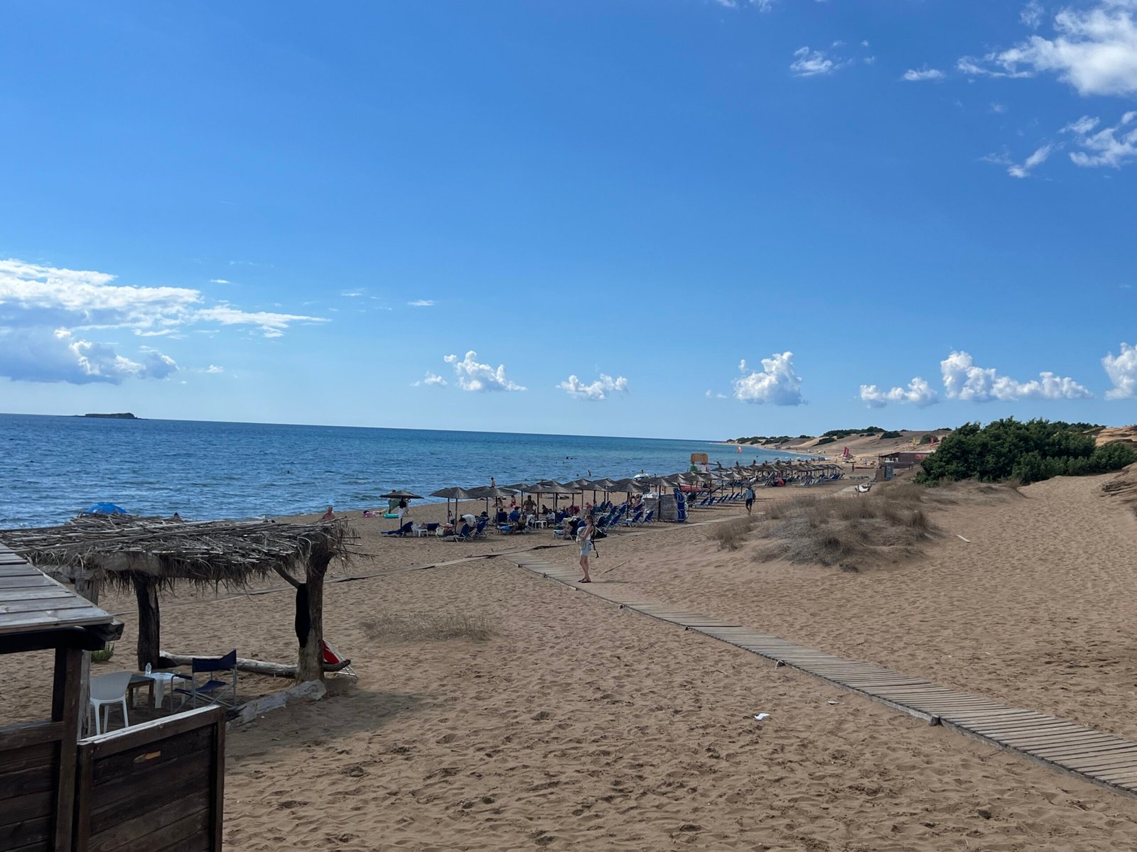 Boardwalk and sun loungers on Issos Beach