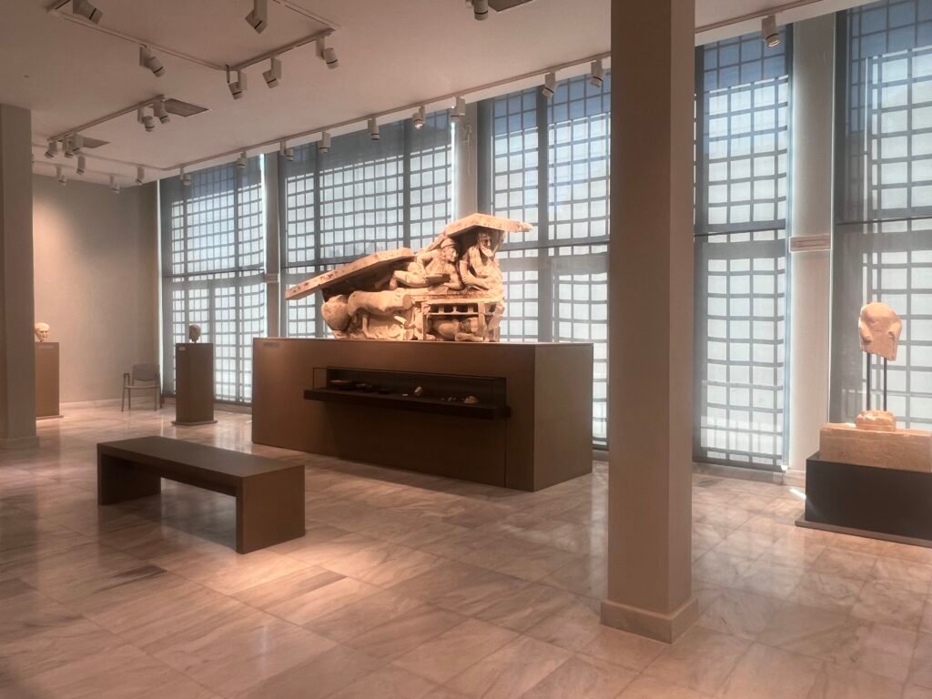 The surviving pediment with a Dionysian banquet scene.