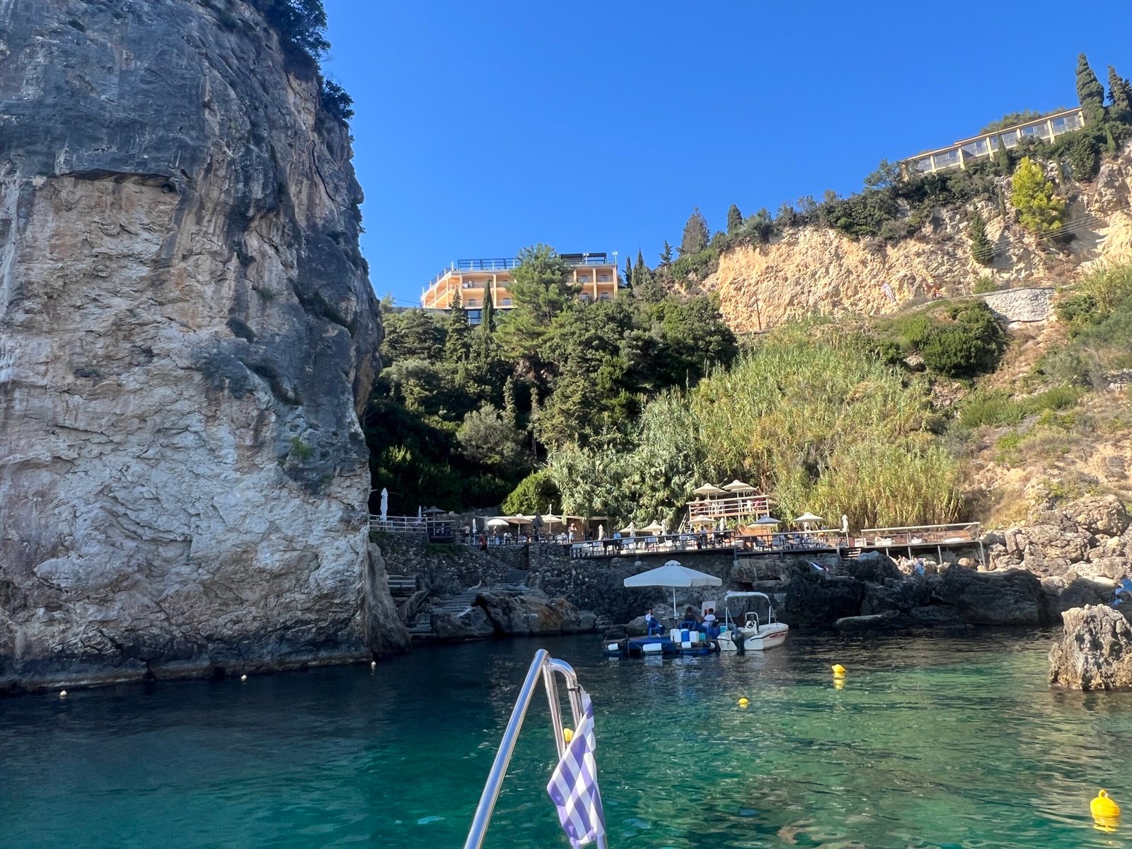 La Grotta rocky inlet with turquoise water and waterfront platforms